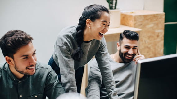 Colleagues sharing a laugh at work