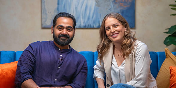 Dr Karan Rajan sitting with Sara Andres Barrio in the studio