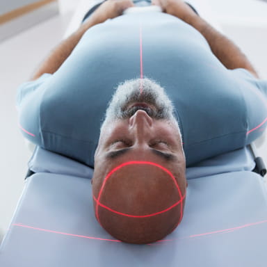 A man undergoing a head-scan