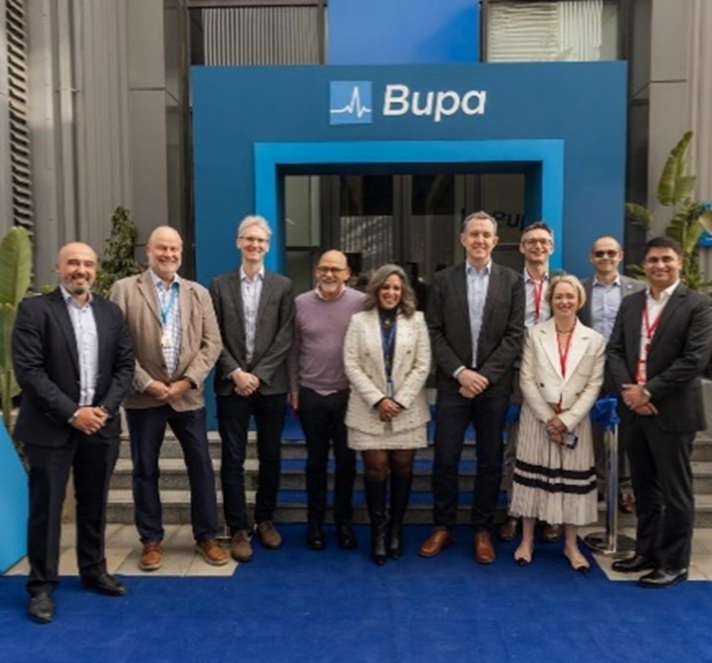 Photo of Bupa leadership team outside the Bupa Capability Centre in Egypt