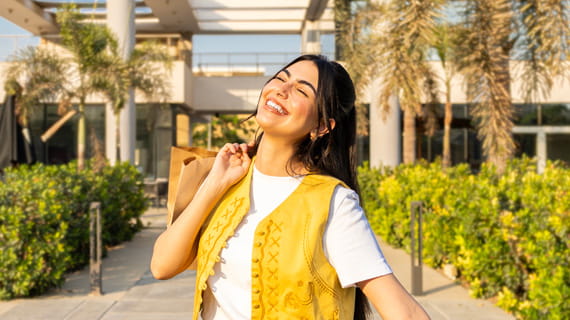 Person happily basking in the sun