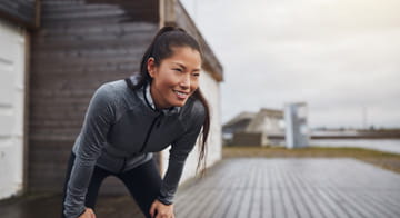 Woman outdoors resting after exercise