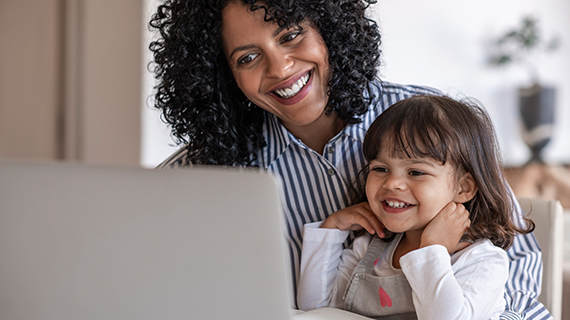 A woman and child on an online video call to boost their social wellbeing
