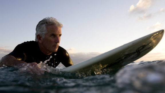 Older man surfing
