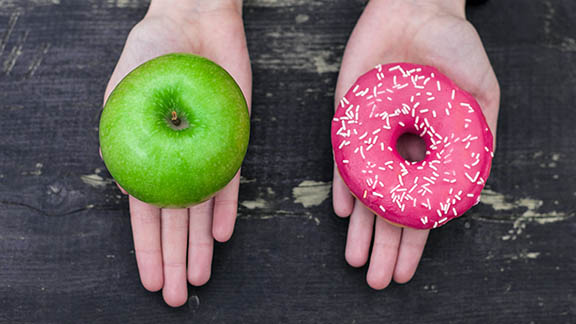 A green apple and a donut