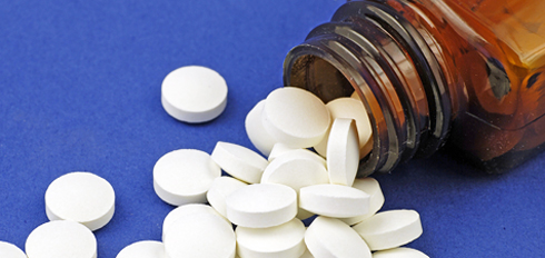 bottle of white pills