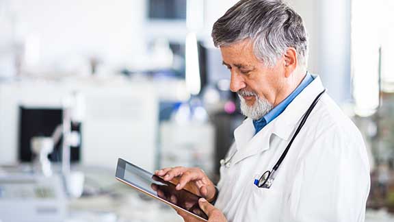 Doctor holding a tablet